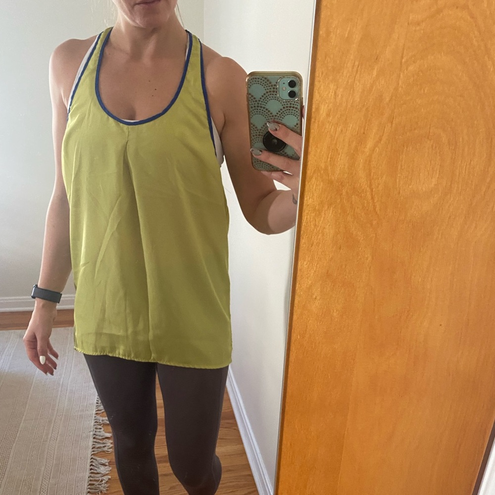 Green over sized tank with blue edges